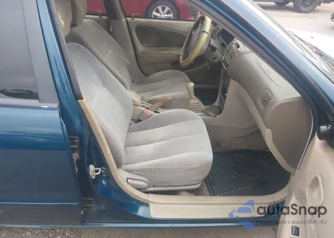 1999 Toyota Corolla Ce из США, поврежденный, VIN 2T1BR12E5XC211594